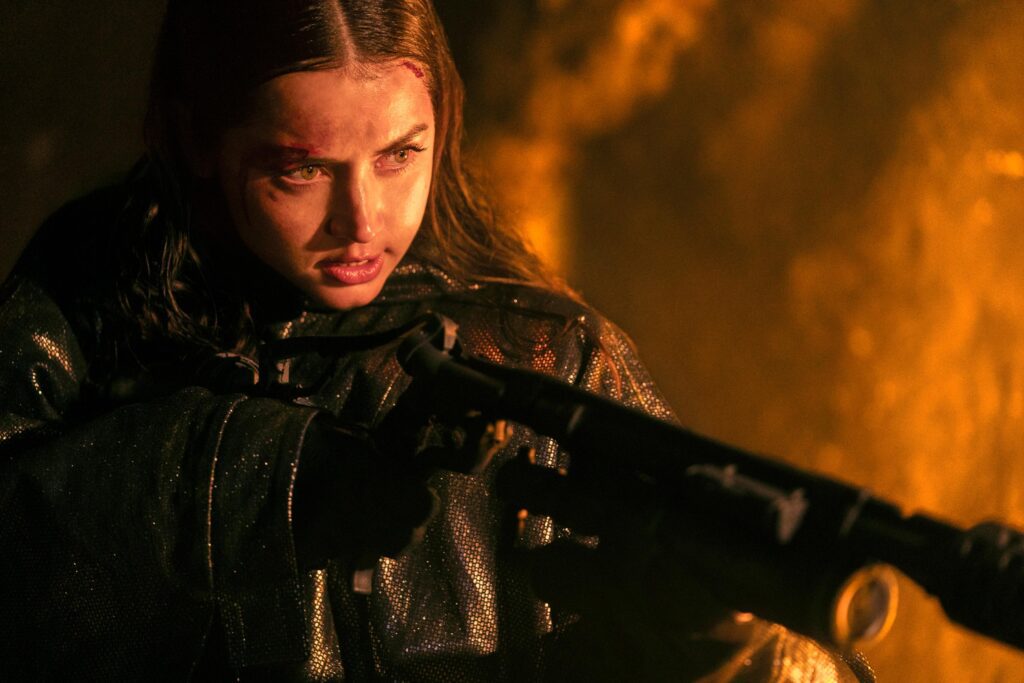 Eve with a flamethrower. All visuals belong to Lionsgate and the creators of the John Wick universe.