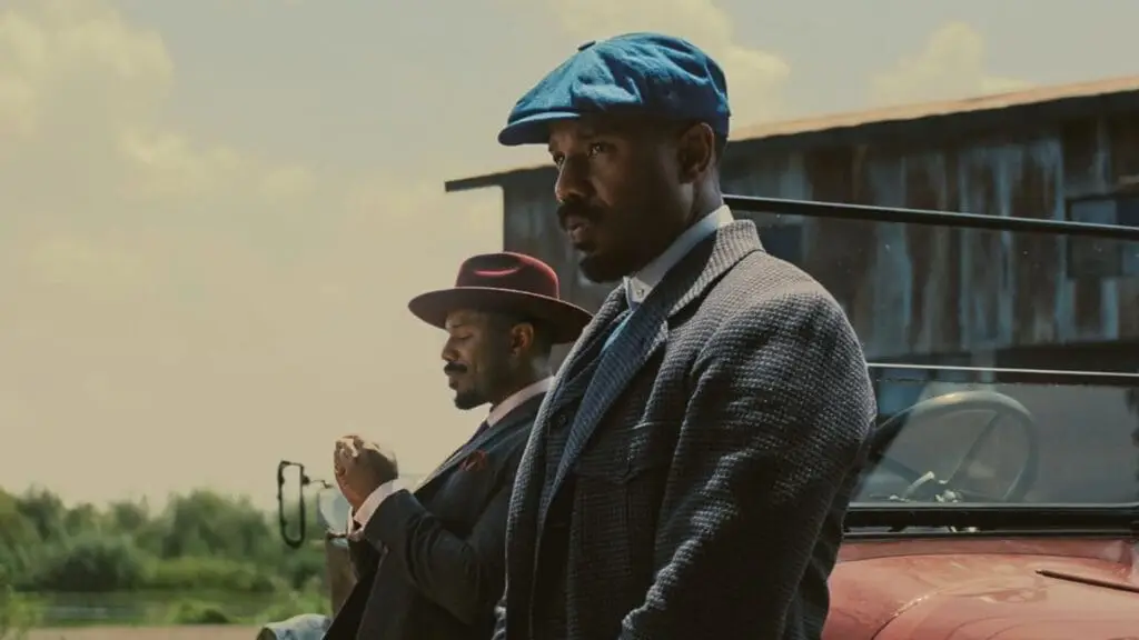 Michael B. Jordan plays twin brothers, Smoke/Stack. Image © Warner Bros.