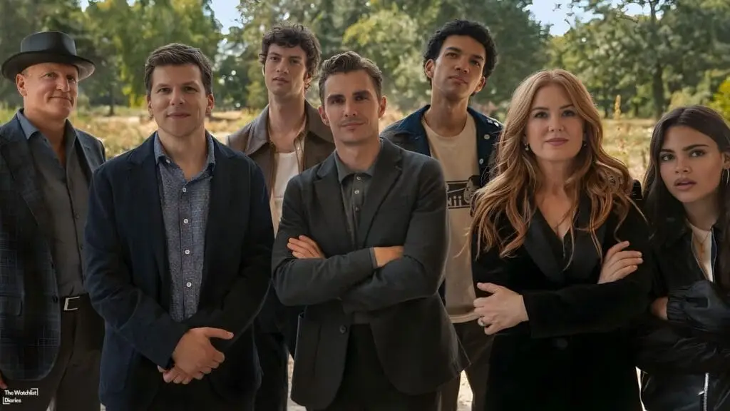Cast of “Now You See Me: Now You Don’t” 2025 featuring Jesse Eisenberg as Daniel Atlas, Isla Fisher as Henley Reeves, Dave Franco as Jack Wilder, Woody Harrelson as Merritt McKinney, Justice Smith as Charlie, Dominic Sessa as Bosco, and Ariana Greenblatt as June standing together. Image © Summit Entertainment / Cohen Pictures / Lionsgate