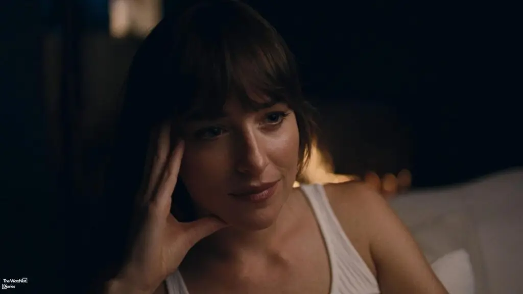 Edited still of Dakota Johnson as Julie. Image © Neon | Topic Studios