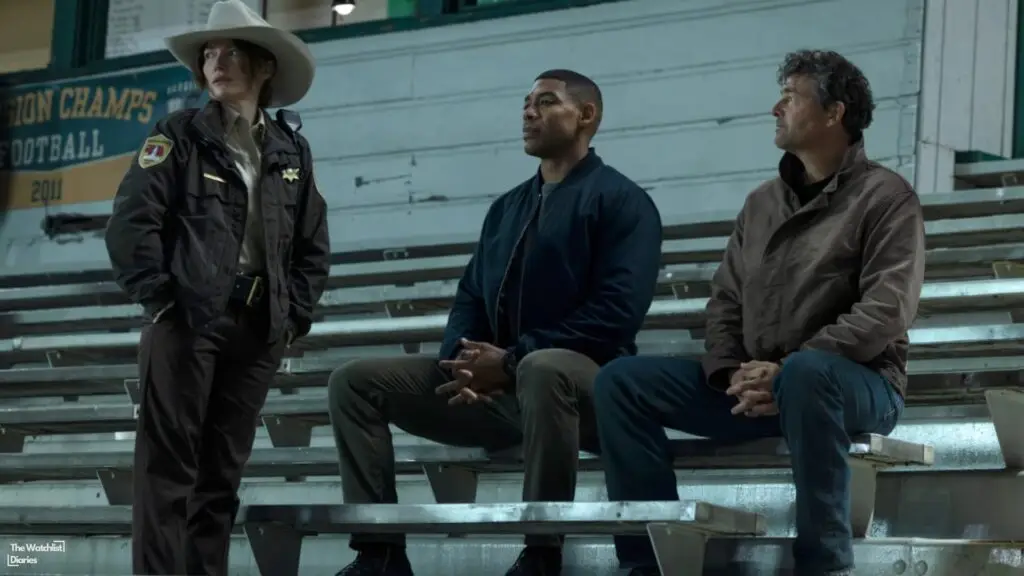 Kyle Chandler, Kelly Macdonald, and Aaron Pierre in Lanterns (2026). Image © Warner Bros. Pictures | DC Studios